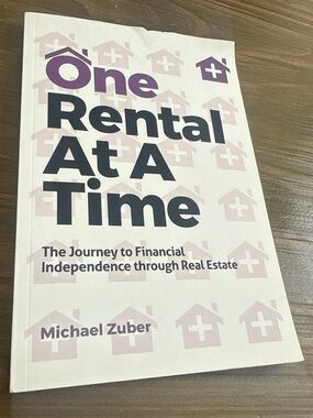 One Rental At A Time by — White & Purple Cover Real Estate Guide